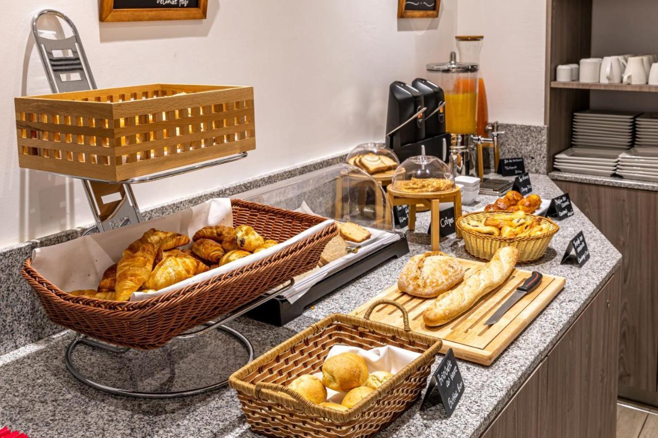 Fraser Suites Paris La Defense Courbevoie Exterior foto A breakfast buffet at a hotel