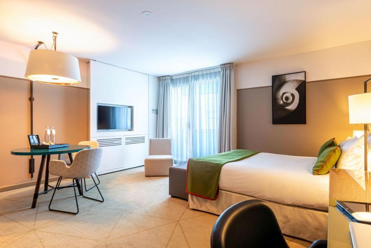 Fraser Suites Paris La Defense Courbevoie Exterior foto A room at the hotel