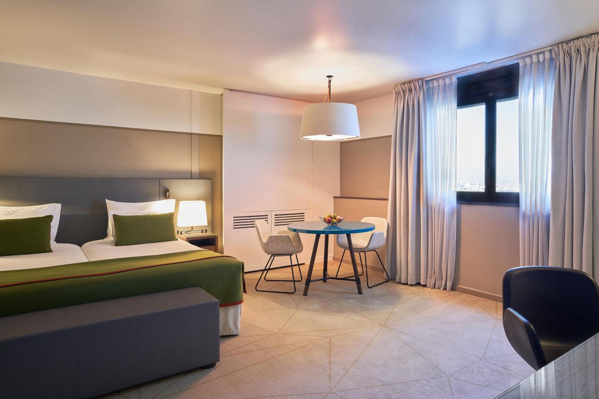 Fraser Suites Paris La Defense Courbevoie Exterior foto A room at the hotel