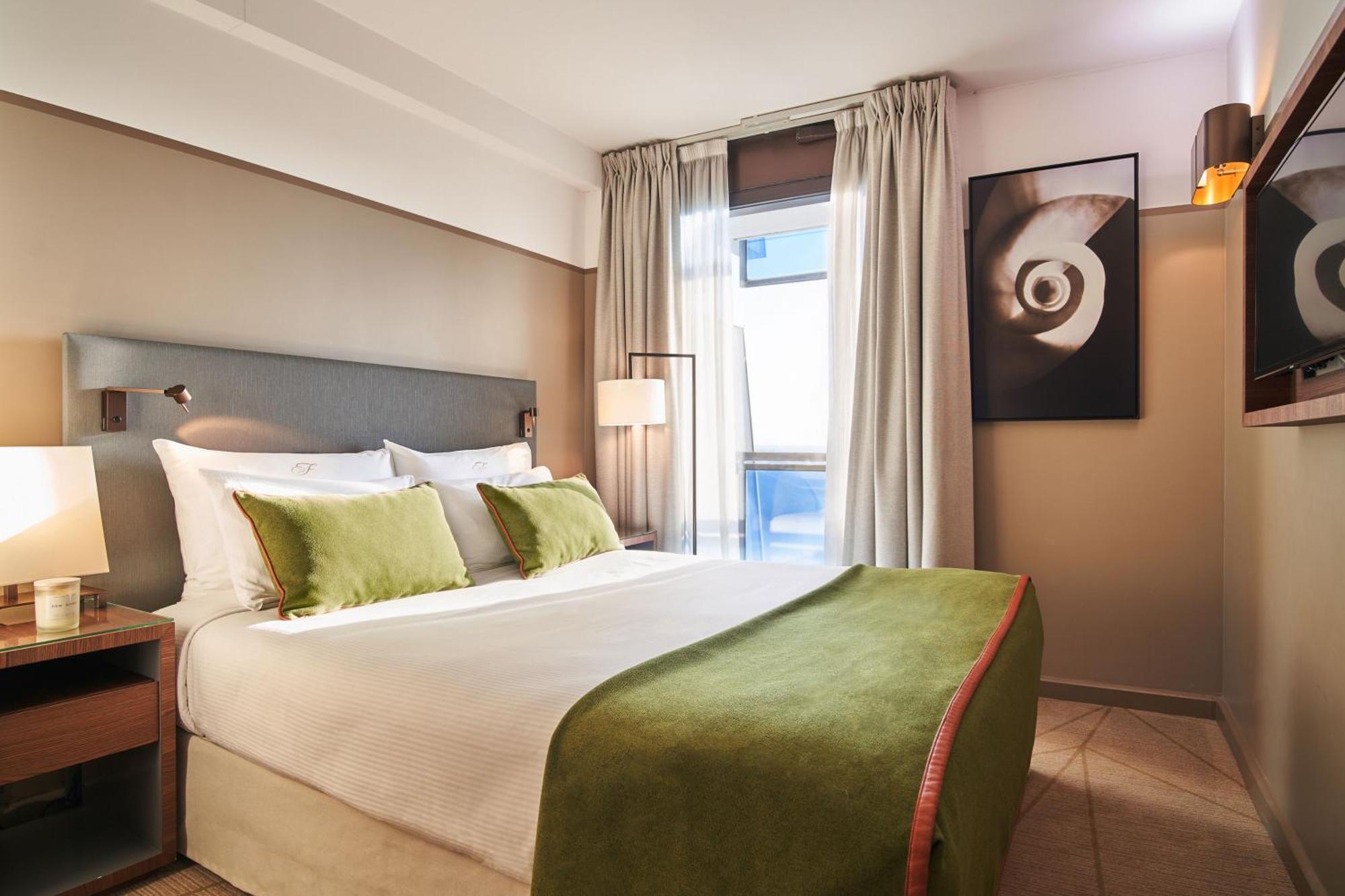 Fraser Suites Paris La Defense Courbevoie Exterior foto A bedroom at the hotel
