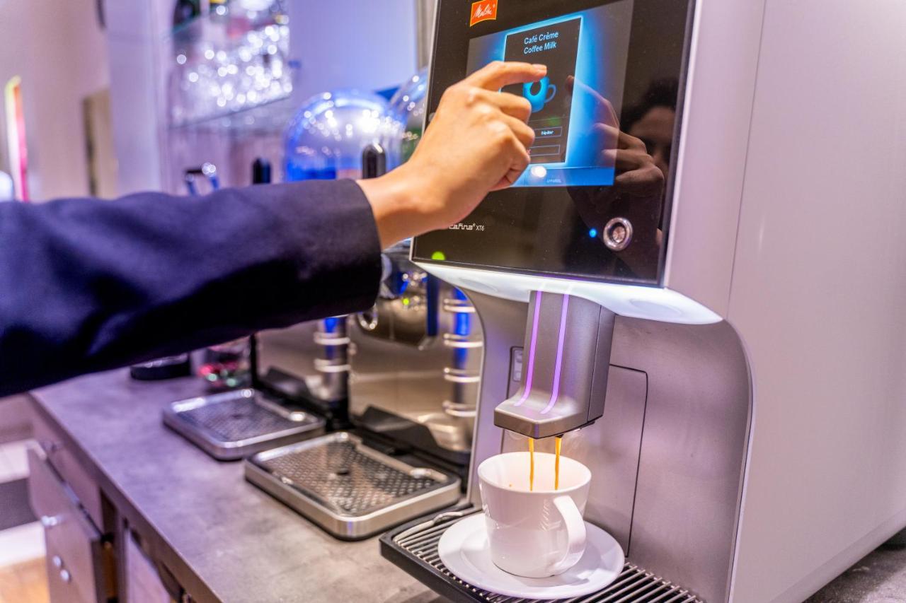 Fraser Suites Paris La Defense Courbevoie Exterior foto A coffee machine